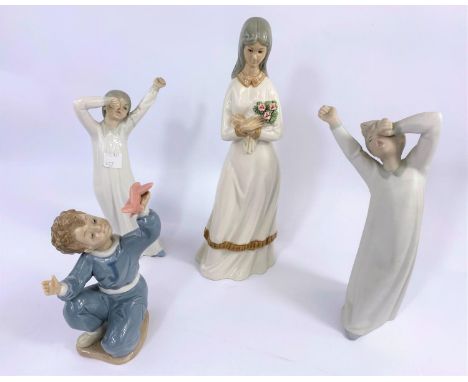 A Nao figure:  boy with toy plane; 3 other Nao style figures of children (1 arm a.f.) 
