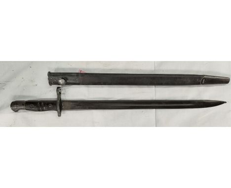 A UK 1917 Enfield Bayonet, handle with wood sides, steel mounted leather Scabbard; blade 43cm. 