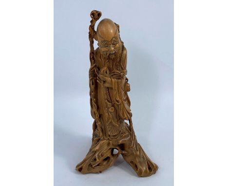 A Chinese carved wood figure of a sage, ht. 24cm -&nbsp;(Finely carved rootwood, some cracks notably to face, top of stick br