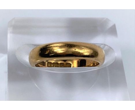 A 22 carat hallmarked gold wedding ring, 5.8 gm 