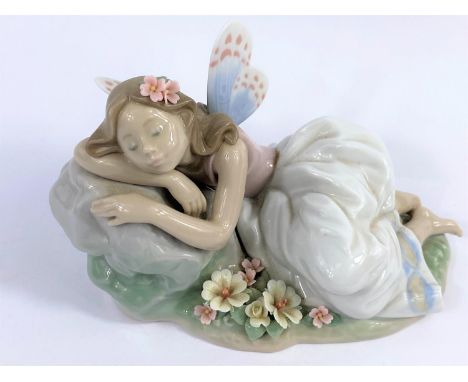 A Lladro privilege figure, girl with butterfly wings No/ 7694, width 16cm.&nbsp; In good condition.