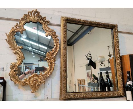 A wall mirror rococo style shaped acanthus frame; a rectangular gilt framed wall mirror; a gilt framed oval wall mirror 