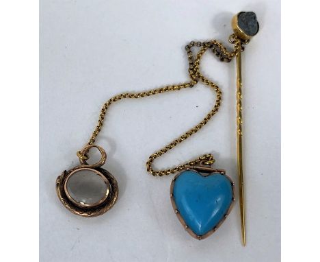 A yellow metal stick pin with cameo, a small locket and magnifier, set turquoise stone 