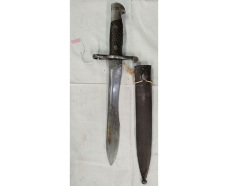 A Spanish 1941 pattern Bolo Bayonet, with cross hatched wooden sides to the handle, steel Scabbard; blade 25cm, Marked TOLEDO