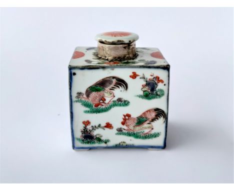 A Chinese porcelain tea caddy decorated with flowers and cockerels, with a white metal mount and porcelain lid (lid chipped) 