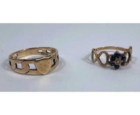 A 9 carat hallmarked gold chain link signet ring; a 9 carat hallmarked gold sapphire and diamond cluster ring on pierced shan