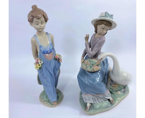 A Lladro collectors figure:  flower girl in dungarees, height 24 cm; a group:  girl with grapes and goose (finger a.f.) 
