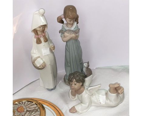 Three Lladro figures: girl with cat, height 29 cm; girl with basket (stick missing); and cherub