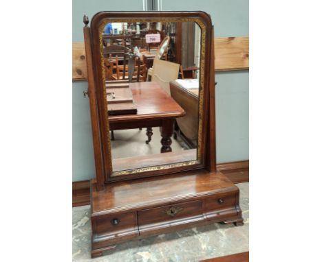 A Georgian style dressing table mirror in walnut free standing frame with drawers to base 