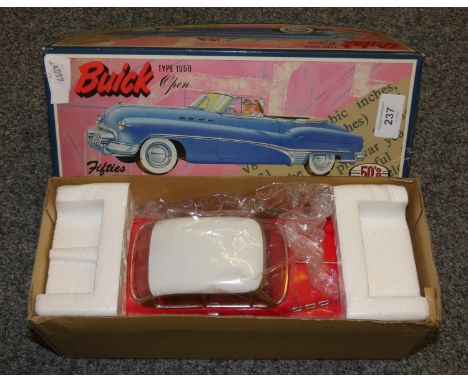 A boxed Japanese model of a circa 1950's Buick car, apparently unused 