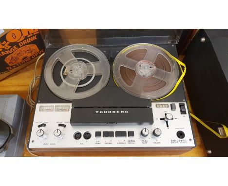 A pair of Wharfdale XP2 floor mounted speakers, A Tandberg series 4000 reel to reel player and another pair of speaker. 
