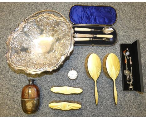 A yellow enamel and silver four piece dressing table set, Birmingham 1931, a leather, glass and electroplated hip flask and o