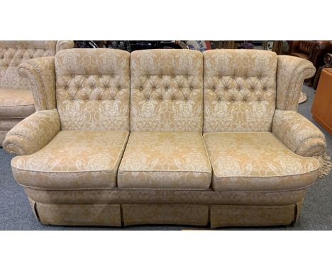 A two piece suite comprising a 3 and 2 seater settees in button back light brown fabric, 175 and 204 cm wide (2). 