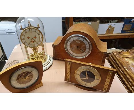 A Kundo white painted brass Anniversary clock, a Metamec clock, two other clocks and 3 oil on board paintings. 