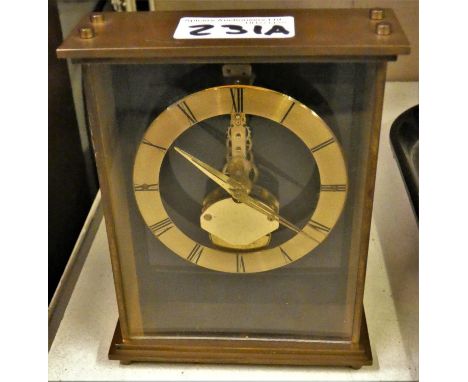 A Kaiser brass cased 7 jewel 8 day carriage clock. With perspex front and back and floating skeleton mechanism, 14cm. Running