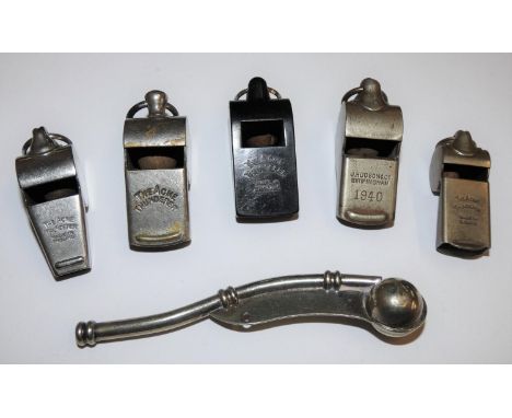 A electroplated bosun's whistle with broad arrow stamp, a J. Hudson &amp; Co. whistle stamped 1940 and four Acme Thunderer wh