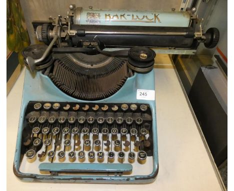 An early 'Bar-lock' typewriter in light blue colour. 