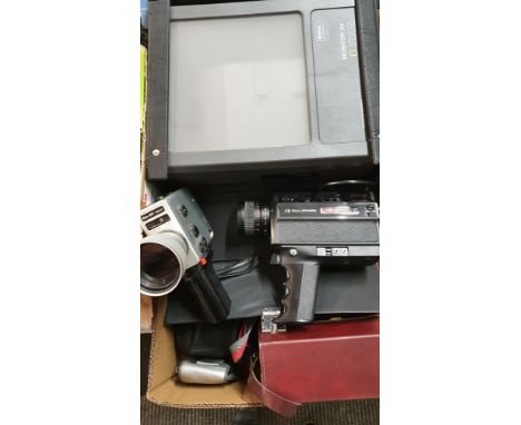 A Nizo 801 Macro cine camera, leather case, a Bell &amp; Howell Filmosonic Macro 8 cine camera and other camera equipment. 