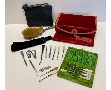 A Miss Dior red velvet box, woven rope edge, traveling nails set, mother of pearl handles, others silver, etc, folding button