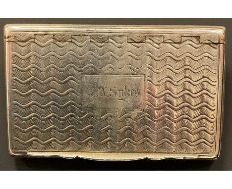 A William IV silver snuff box, wavy lined body, gilt interior, Engraved J W Sykes, Birmingham 1834, 7.6cm x 4.5cm, 67.3g 