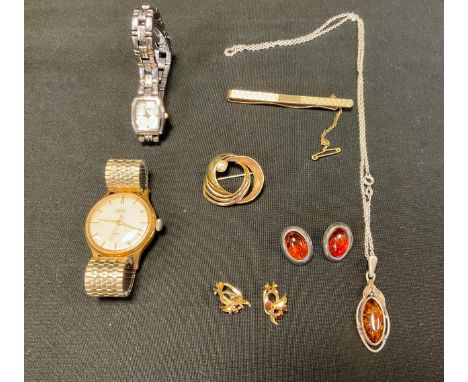 A pair of 9ct gold garnet floral cluster earrings, 2.8g gross;  copal amber sterling silver mounted pendant and earrings ,  S