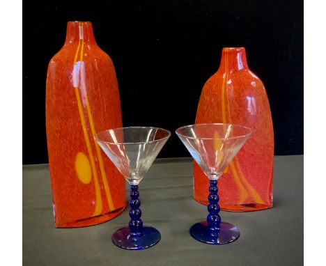 Art glass - A near pair of Dartington 'innovate the art of glass 'bottle shaped vases, in tones of red, orange and yellow, 35