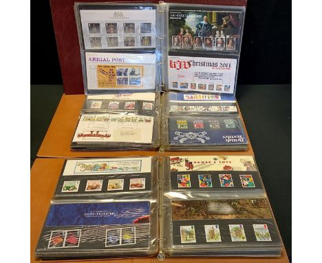 Stamps - Presentation packs, FDCs etc in three Albums, inc Crown Jewels, Thomas the Tank Engine, 2012 Olympics, Thunderbirds,