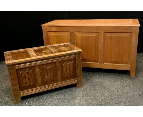 Two Late 20th century oak blanket panel chests; 66cm high x 123cm width x 52cm depth, 45cm high x 79cm width x 40cm depth, 