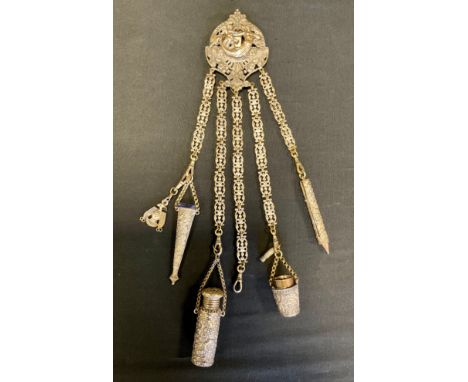 A 19th century silver plated chatelaine, five ornate suspension chains terminating with scissor case, scent bottle, thimble b