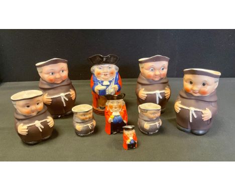 A graduated set of three Royal Worcester Mr Toby character jugs, each no 2831, 14.5cm, 8.5cm and 4.5cm high, printed marks in