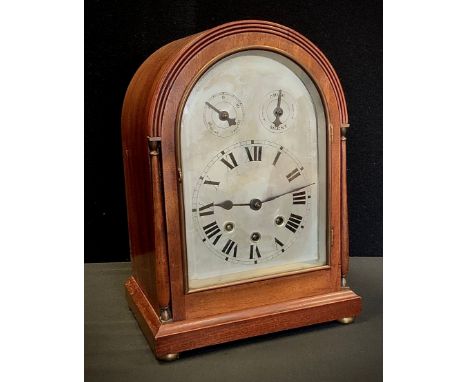 A late 19th century bracket clock, domed top, silvered dial, bold Roman numerals, two subsidiary dial, eight day movement, 34