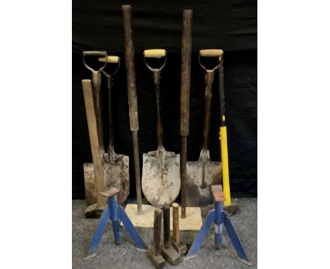 Tools - two cast iron tampers, shovels, sledge hammer, etc. 