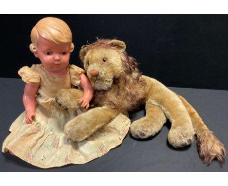 Toys and Juvenilia - a Steiff style golden mohair Lion, 18.5cm x 59;  and a Rheinishche Gummi and Celluloid-Fabrik doll, (2).