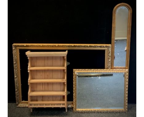 A small wall hanging pine spice rack, three shelves above galleried shelf, 65cm x 41cm;  rectangular gilt framed wall mirror,