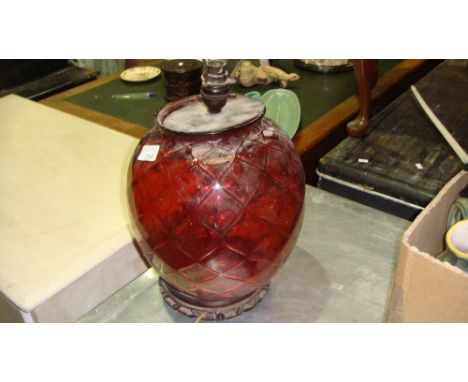 Vintage ruby glass paraffin lamp shade mounted on Chinese hardwood stand converted in early 20th century to electric
