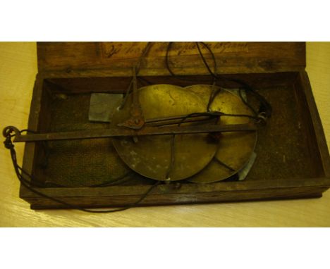 Pair of early 19th century brass and iron drug scales in wooden box & later box of weights