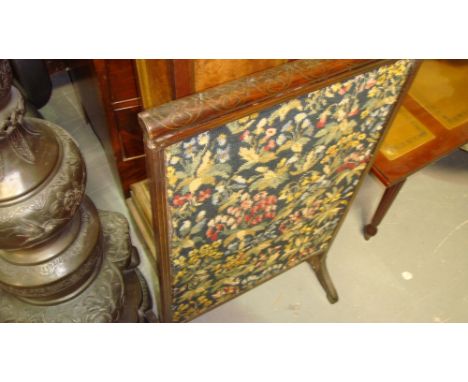 Late 19th century tapestry firescreen inlaid with brass