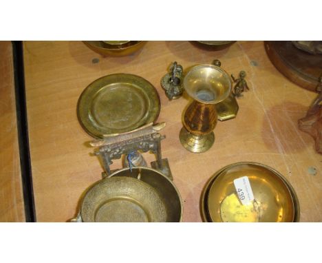 Assorted antique and vintage Asian brass ware including offering & eating bowls, lamp etc.