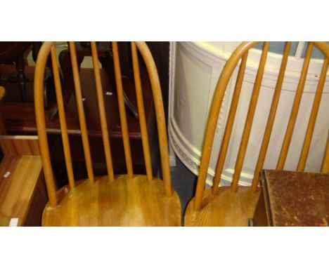 Set of four stick back Ercol style chairs