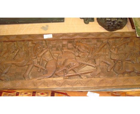 African carved wooden wall plaque depicting Hunting Scene