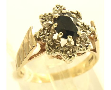 9ct gold diamond and sapphire cluster ring, Size O, 3.7g. P&amp;P Group 1 (£14+VAT for the first lot and £1+VAT for subsequen