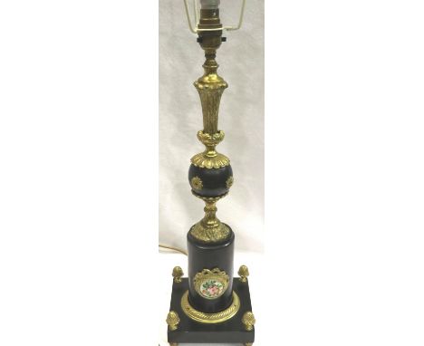 Large ebonised and gilt table lamp with painted ceramic panels and shade, H: 60 cm. Not available for in-house P&amp;P, conta