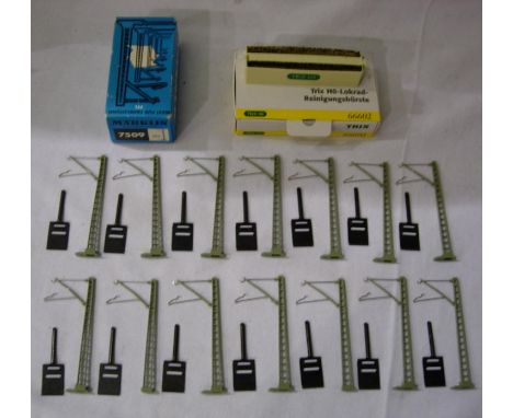 Marklin OO/HO scale fourteen catenery masts with bases and Trix HO 66602 loco wheel cleaner. P&amp;P Group 1 (£14+VAT for the