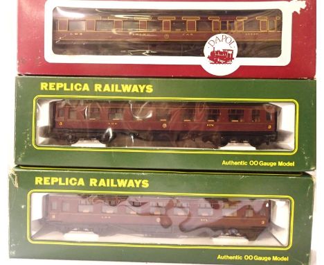 Dapol 12 wheel LMS dining car and two replica LMS Vestibule 2rd coaches, in excellent condition, boxes with wear. P&amp;P Gro