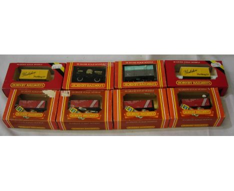 Eight Hornby OO wagons including 4x R094 Pilkington glass, 2x R111 Yorkshire Pudding Co. All excellent condition, boxes with 