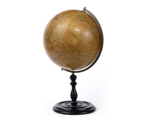 AN EARLY 20TH CENTURY 12 INCH TERRESTRIAL GLOBE by Geographia (1923) Ltd., 55 Fleet St, London, on turned ebonsied stand, 52c