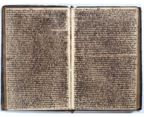 AN 18TH CENTURY LEATHER BOUND MANUSCRIPT BOOK c.218. pp. in a fine small hand in black ink. much smudged. with index on front