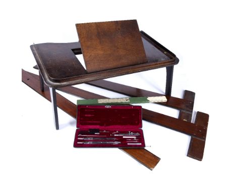 A SET OF T SQUARES by Windsor and Newton, a set of drawing instruments, folding reading table and a set of Reeves card scales