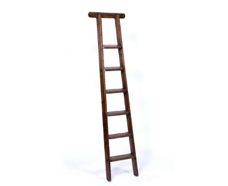 AN ANTIQUE WOODEN LIBRARY LADDER with six steps, 172cm high