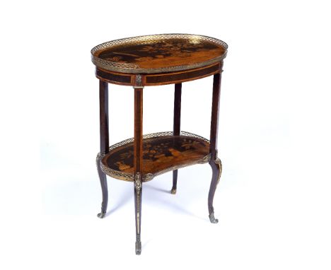 A 19TH CENTURY FRENCH MARQUETRY OVAL TWO TIER OCCASIONAL TABLE, with gilt metal mounts, the top and shaped undertier inlaid w